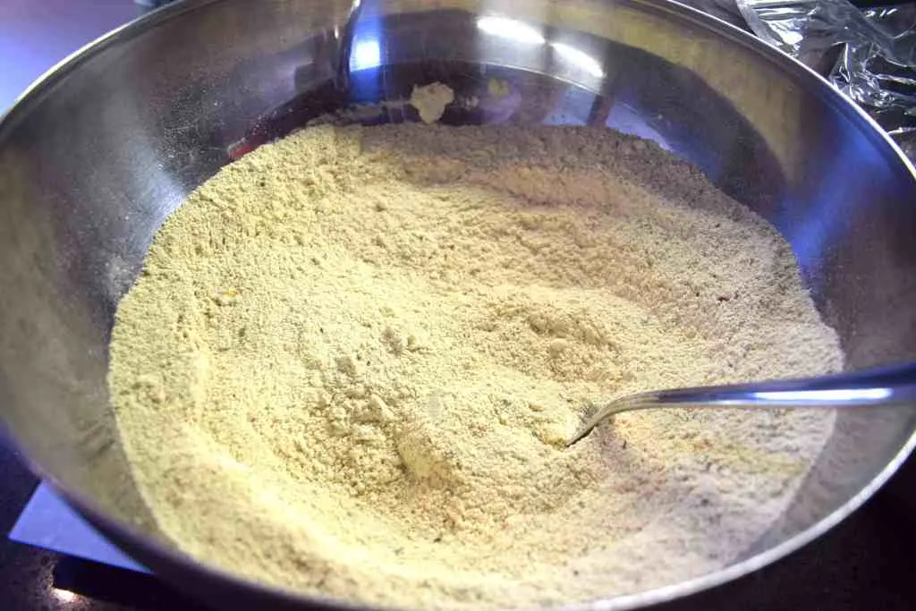 Mixing together keto bread ingredients