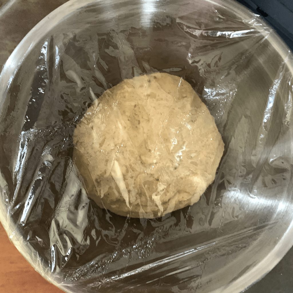 cover keto cinnamon roll dough and let it rise