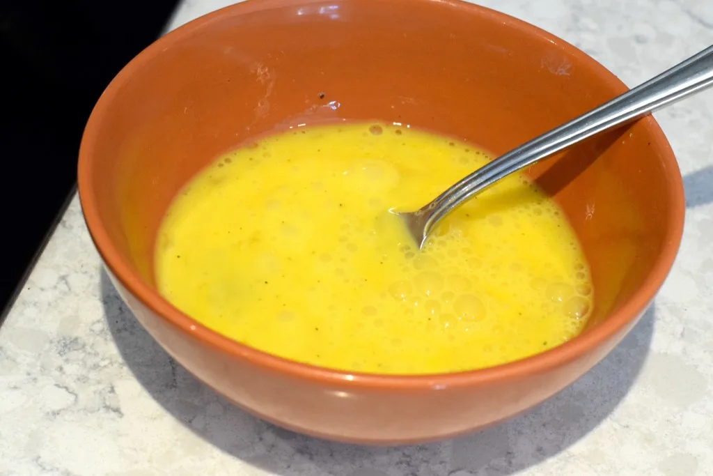 3 eggs whisked together 3 eggs whisked together