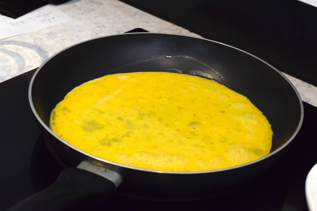 eggs cooking in pan