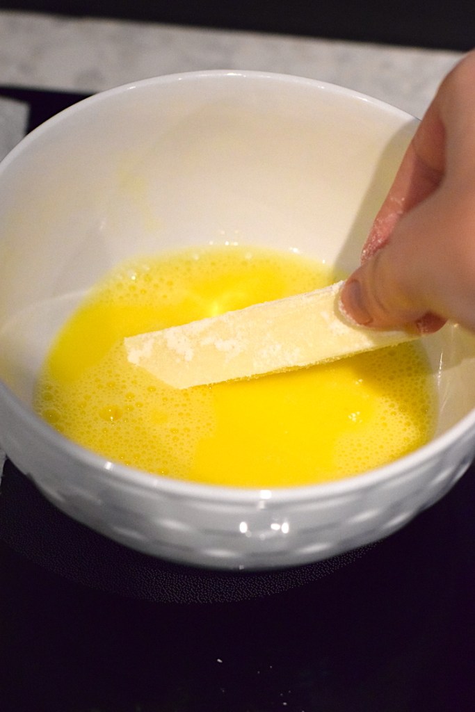 dipping mozzarella in egg wash