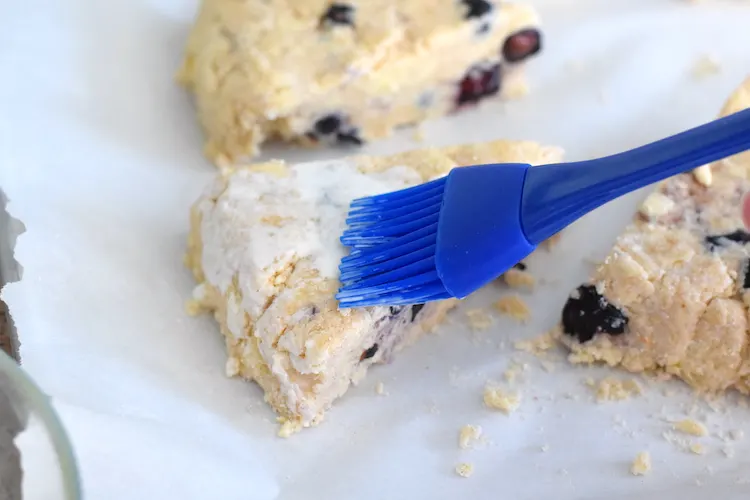 brush keto blueberry scones with cream