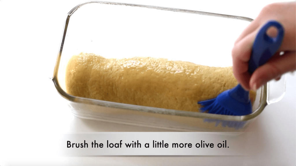 brushing oil on keto bread dough
