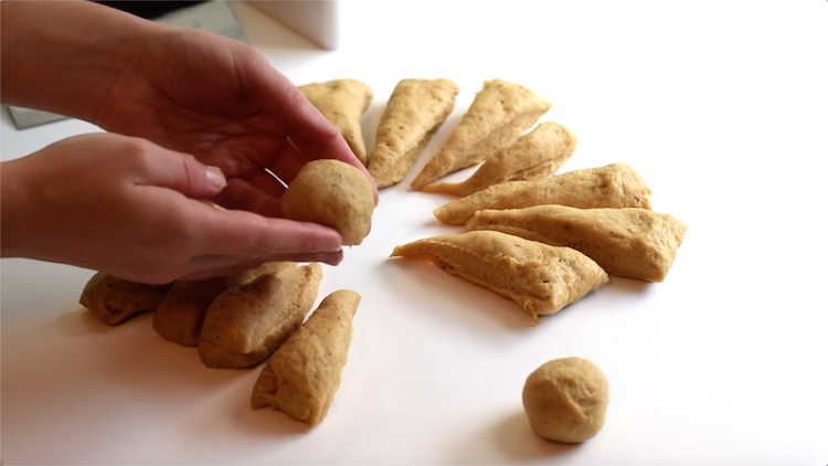 forming bread dough into balls