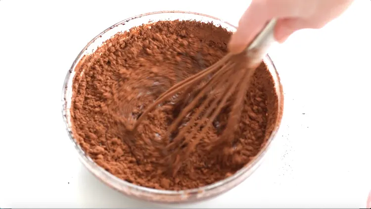 whisking cocoa powder sweetened condensed milk